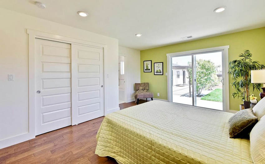 Bedroom with bypass closet doors