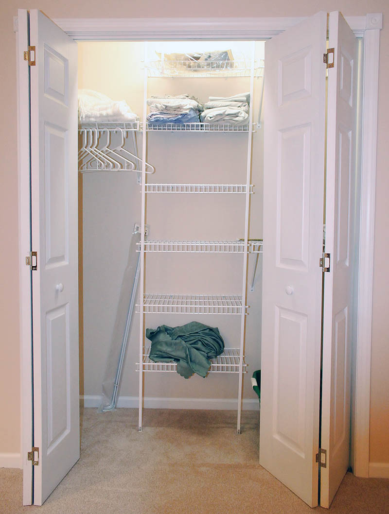 Bi fold closet doors with metal organizer