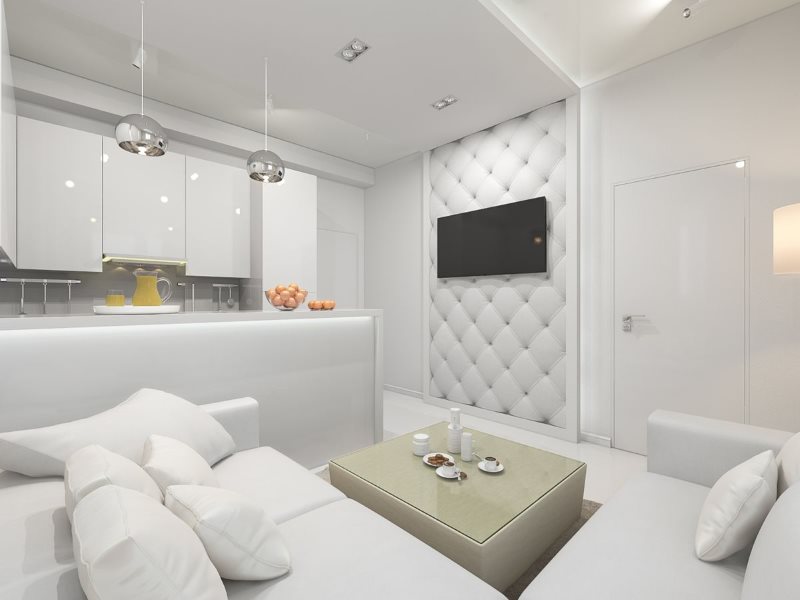 Белый диван в кухне-гостиной стиля минимализма