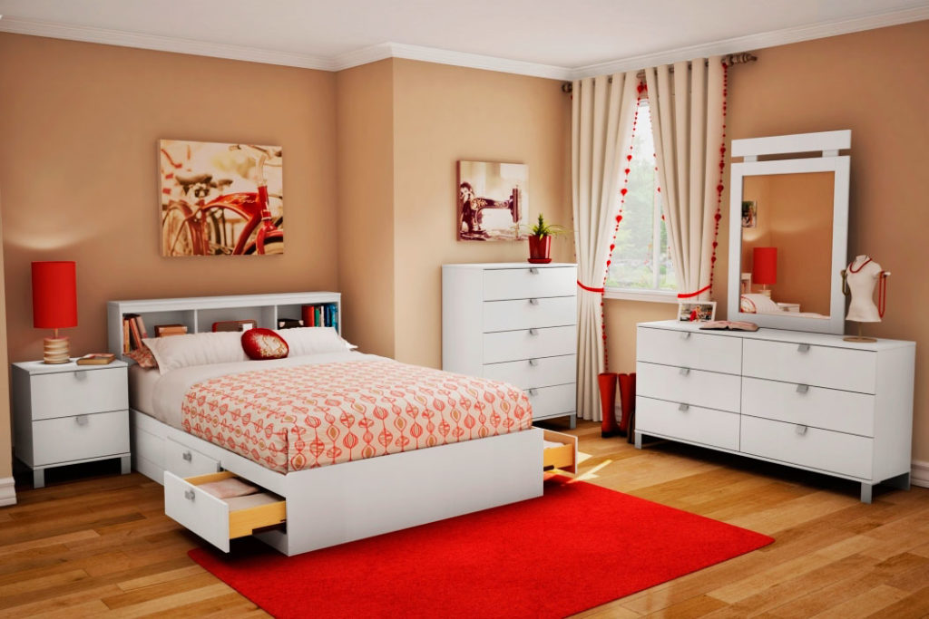 Кровать с выдвижными ящиками в интерьере комнаты девушки