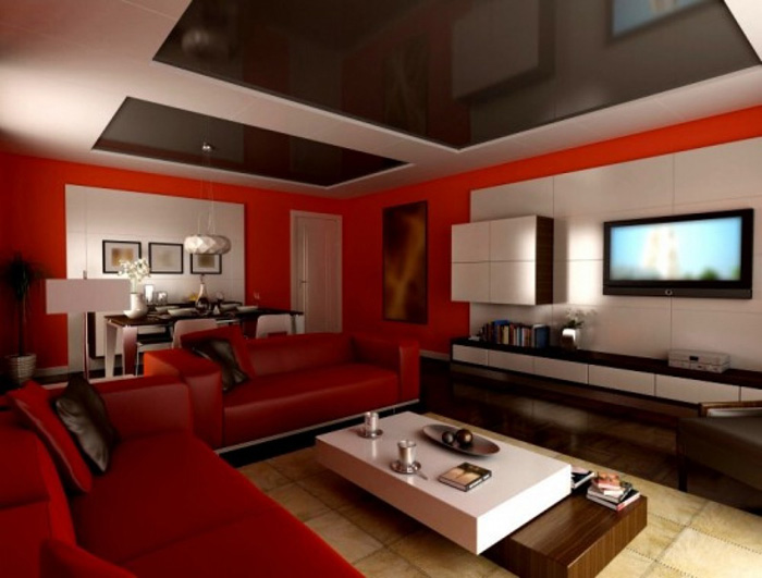 Овормление комнаты с красным диваном